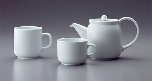 A teacup's handle provides an affordance of holding it with one's hand.